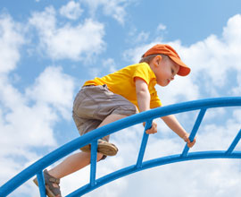 Kid climbing in playground